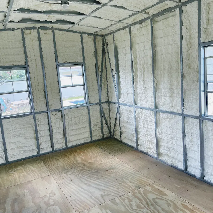 Closed-cell spray foam insulation applied to wall cavities in a residential project in Sans Souci